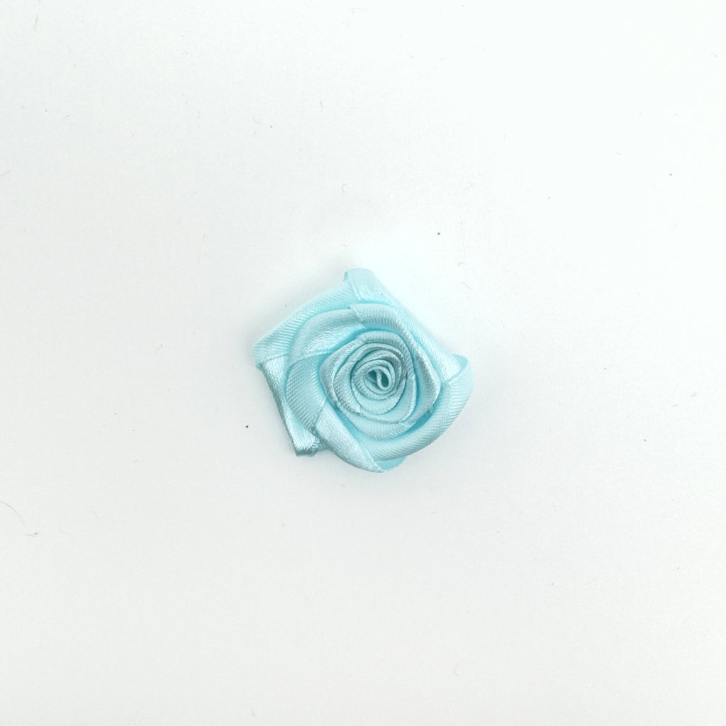 Mini fleur en ruban.