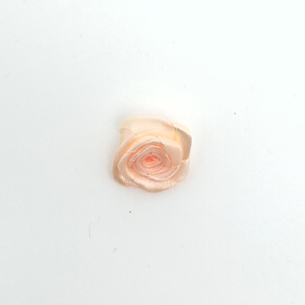 Mini fleur en ruban.