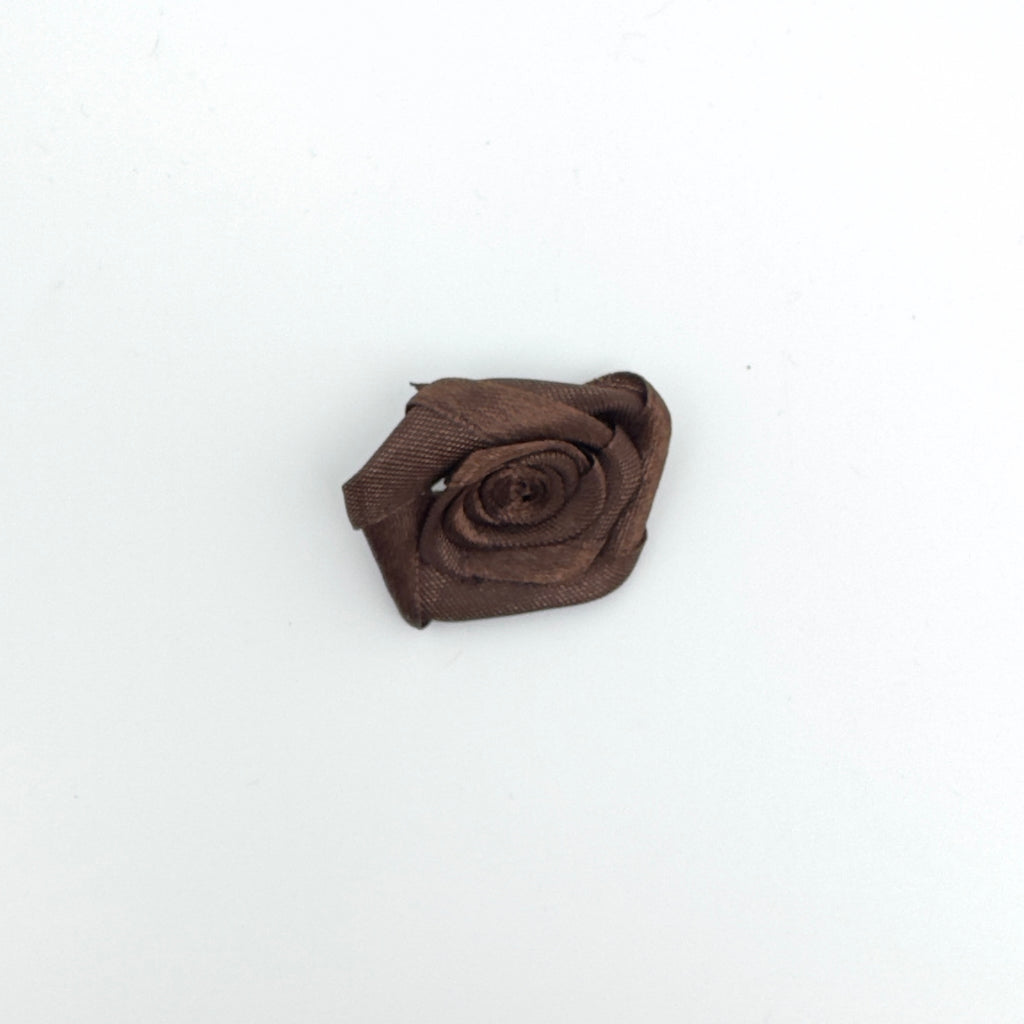 Mini fleur en ruban.