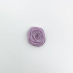 Mini fleur en ruban.